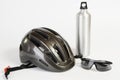 Bike helmet sunglasses and metal water flask Royalty Free Stock Photo