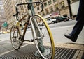 Bike hitched on street sign