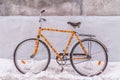 Bike insulated knitted garment decorated on a snowy street