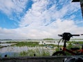 Bike, lake and bright sky