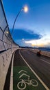Bike lane on the bridge with sunset background
