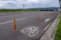 Bike lane on suburban street. Bicycle path. Sign for bicycle painted on the asphalt. Royalty Free Stock Photo
