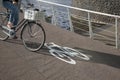 Bike Lane Symbol and Cyclist in Amsterdam; Holland Royalty Free Stock Photo