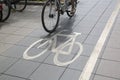 Bike Lane Symbol and Cyclist on Street; Frankfurt