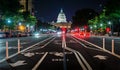Bike lanes on Pennsylvania Avenue and the United States Capitol at night, in Washington, DC