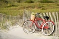 Bike leaning against fence Royalty Free Stock Photo