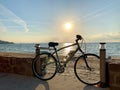 A bike leaning against the wall by the beach Royalty Free Stock Photo