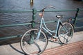 Bike locked to bridge in Amsterdam stock picture Royalty Free Stock Photo