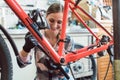 Bike mechanic working on gears of a bicycle