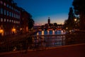 Bike near bridge railing and Stockholm City Hall Stadshuset, S