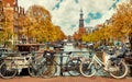 Bike over canal Amsterdam city picturesque town Royalty Free Stock Photo