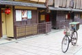 June 2018, Bike box parked ancient wooden buildings, Gion, Kyoto, Japan Royalty Free Stock Photo
