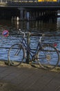 Bike is parked under the sign ÃÂ«no bikesÃÂ»