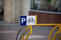 Bike parking plate on a metal structure for tying a bike to a padlock