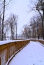 Bike Path Covered with Winter Snow in Autumn Royalty Free Stock Photo