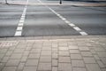 bike path at the crossroads in the form of white dotted stripes