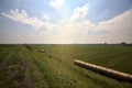 Bike path on an enbankment in the middle of the fields in the italian countryside in summer Royalty Free Stock Photo