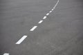 Bike path. Markings on the road. Broken white line on asphalt Royalty Free Stock Photo