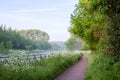 Bike path next to the river Royalty Free Stock Photo