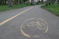 Bike path in the park: sign on the asphalt