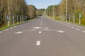 Bike and pedestrian lane with sign and fence