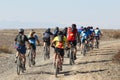 Bike race on desert road Royalty Free Stock Photo