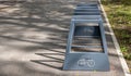 Bike rack in the park in the parking lot on a clear sunny day Royalty Free Stock Photo