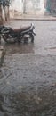 Bike rain in road india