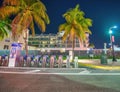 Bike rental station at night in a tropical location Royalty Free Stock Photo