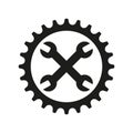 Bike repair and servicing. Logo and icon. Bicycle sprocket and crossed wrenches. Royalty Free Stock Photo