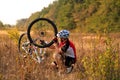 Bike repair. Young man repairing mountain bike Royalty Free Stock Photo