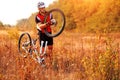 Bike repair. Young man repairing mountain bike Royalty Free Stock Photo