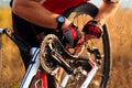 Bike repair. Young man repairing mountain bike Royalty Free Stock Photo