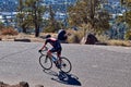 A bike rider cruises along the top of Pilot Butte in Bend, Oregon