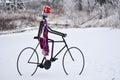 Bike Rider Riding a Bike in the Snow, Statue