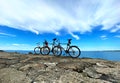 bike on rock stone ,Biking mountain on horizon blue sky white clouds nature panorama seascape landscape