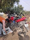 Bike service station under mango tree