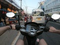 Bike street first person view scooter asia thailand urban city ride Royalty Free Stock Photo