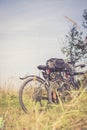 Bike tour: Bikes, grass and blue sky. Outdoors, text space Royalty Free Stock Photo