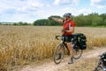 Bike traveler got lost on the way, cyclist tourist looking for the road