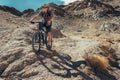 Bike traveler rides on mountain race Royalty Free Stock Photo