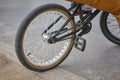 Bike wheel detail with rider. Sport background. Royalty Free Stock Photo