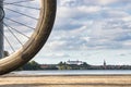 bike wheel in front of a shot of grosser Ploner see (name of lake) in background plon castle