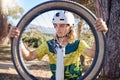 Bike wheel, repair and man checking before doing maintenance on damaged or broken bicycle. Athlete doing inspection on Royalty Free Stock Photo