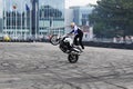 Bike wheelie motorcycle stunt rider acrobatics Royalty Free Stock Photo