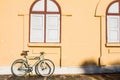 Bike and window of an old building in the background. Royalty Free Stock Photo