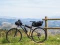 Bikepacking bike in a hilly landscape. Concept: cycle-tourism, adventures