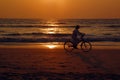 Biker on the Beach at Sunset Royalty Free Stock Photo