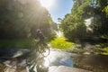 Biker in Berlin Tiergarten with lens flares