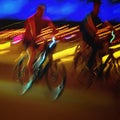 Biker on the bicycle close-up, night city lights, bokeh. Sport, healthy lifestyle concept, motion blur effect. Abstract Royalty Free Stock Photo